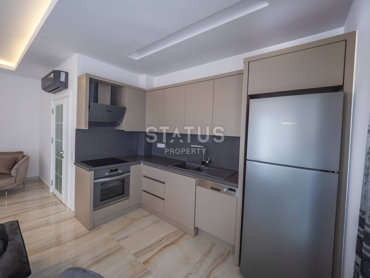 Apartments 1+1 and 2+1 in a new finished complex 500 meters from the sea in Kargicak, from 60 to 110 sq.m. фото 4