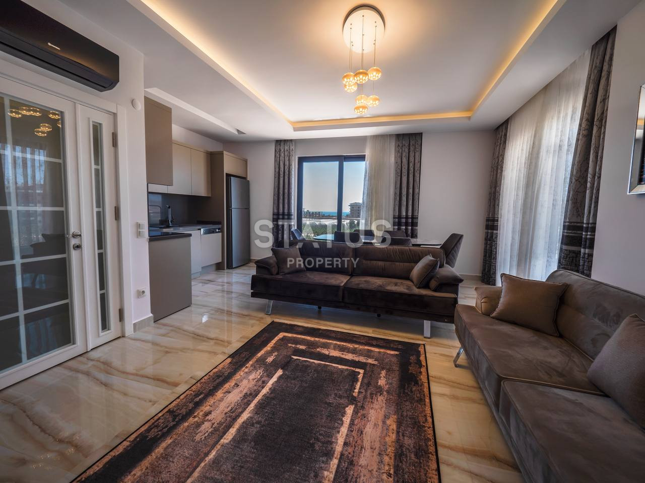 Apartments 1+1 and 2+1 in a new finished complex 500 meters from the sea in Kargicak, from 60 to 110 sq.m. фото 5