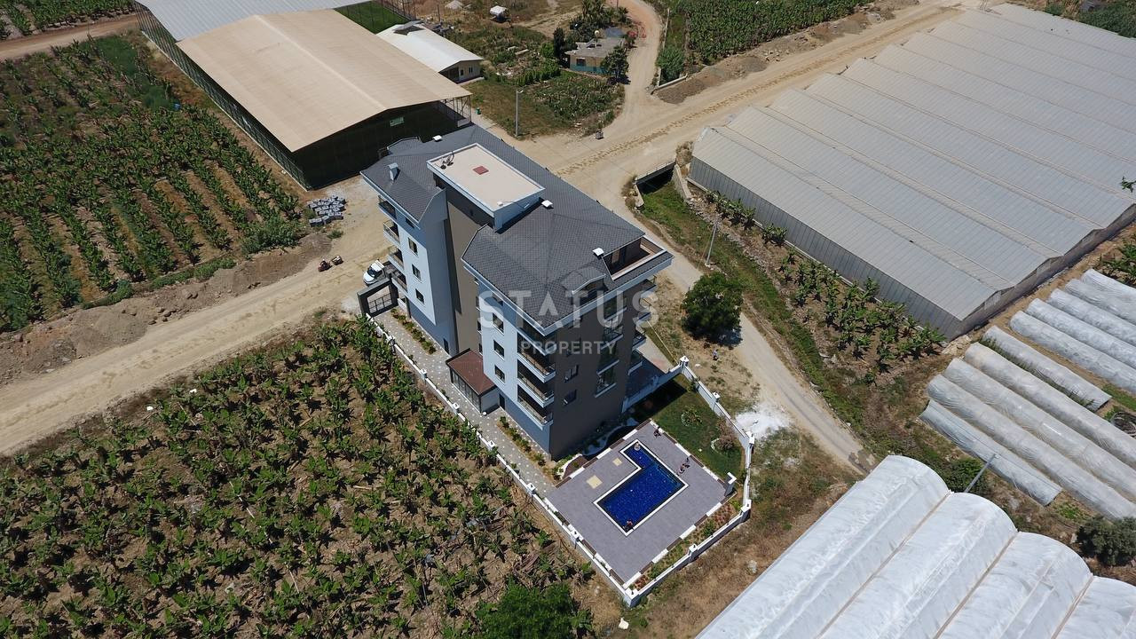 Apartments 1+1 and 2+1 in a new finished complex 500 meters from the sea in Kargicak, from 60 to 110 sq.m. фото 14