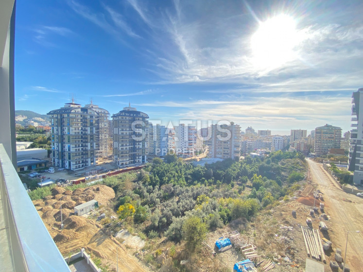 Просторные апартаменты 2+1 с видом на горы и море, в районе Махмутлар 120 кв.м. фото 1