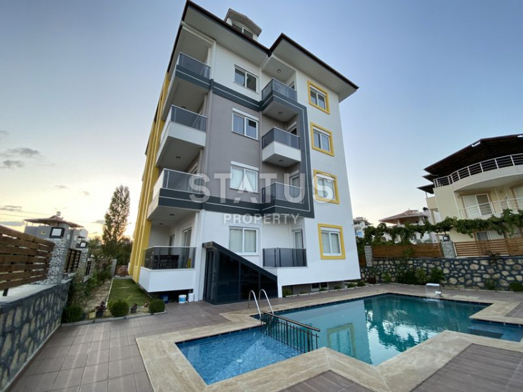 Меблированные апартаменты 1+1, в районе Авсаллар, 65 кв.м. фото 1