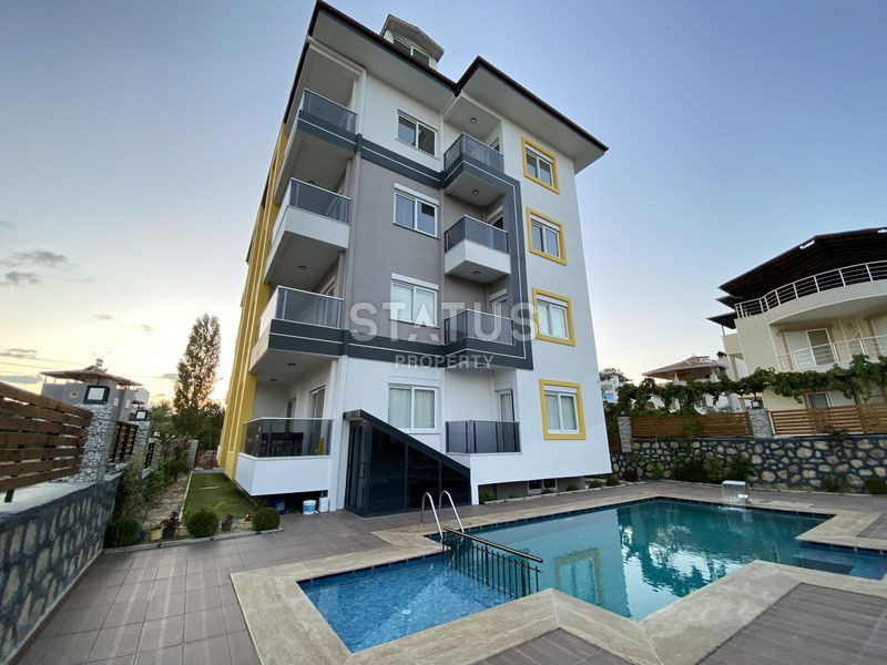 Меблированные апартаменты 1+1, в районе Авсаллар, 65 кв.м. фото 1