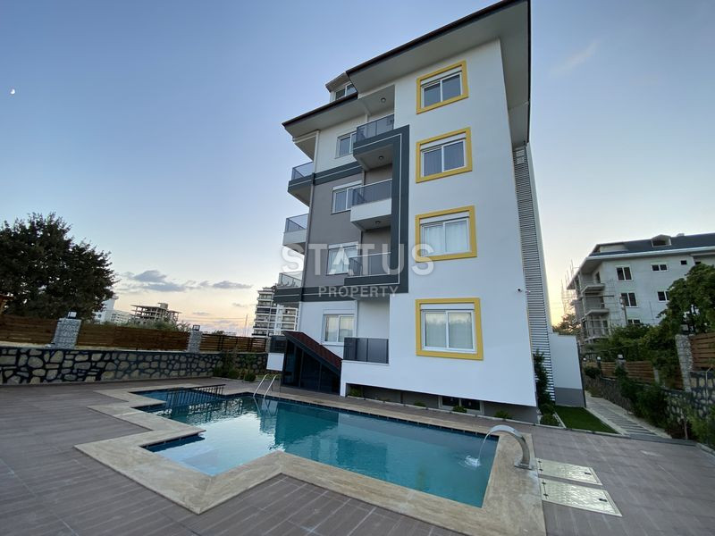 Меблированные апартаменты 1+1, в районе Авсаллар, 65 кв.м. фото 2
