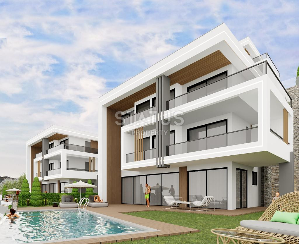 Виллы 5+1 с садом и панорамным видом на море и крепость в центре Алании, 315 м2. фото 13