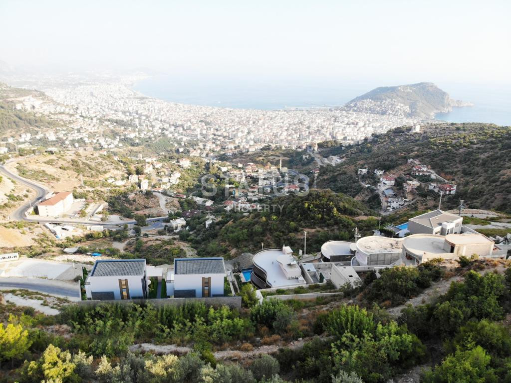 Виллы 5+1 с садом и панорамным видом на море и крепость в центре Алании, 315 м2. фото 20