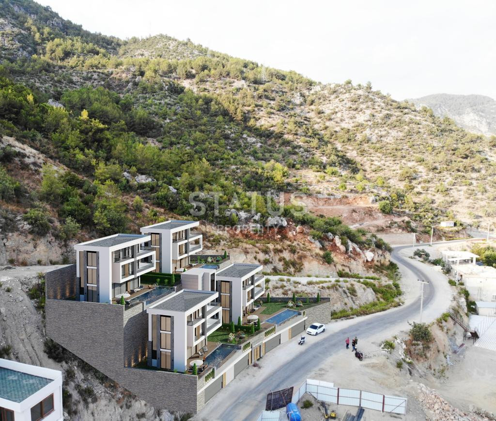 Виллы 5+1 с садом и панорамным видом на море и крепость в центре Алании, 315 м2. фото 27