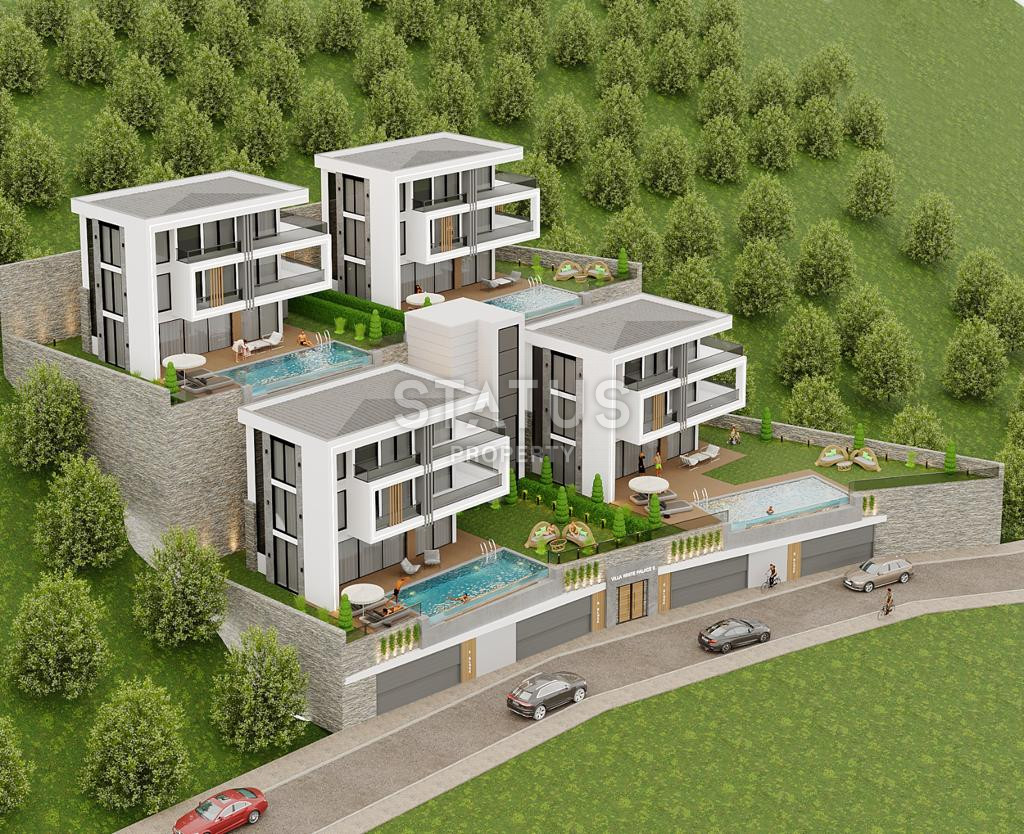 Виллы 5+1 с садом и панорамным видом на море и крепость в центре Алании, 315 м2. фото 30