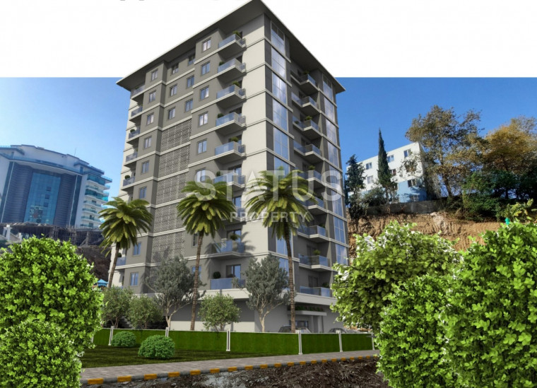 Инвестиционный проект на стадии котлована в Махмутларе, апартаменты от 51,4 до 120 м2. фото 1