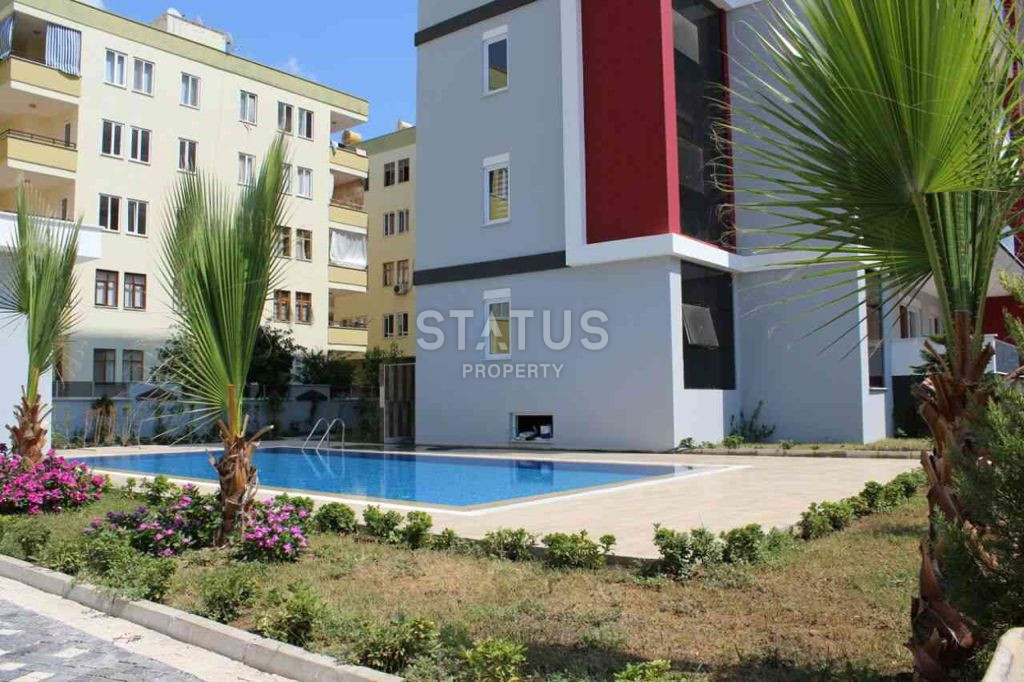 Меблированные апартаменты 2+1, в 300 метрах от моря, в районе Махмутлар, 110 кв.м. фото 16