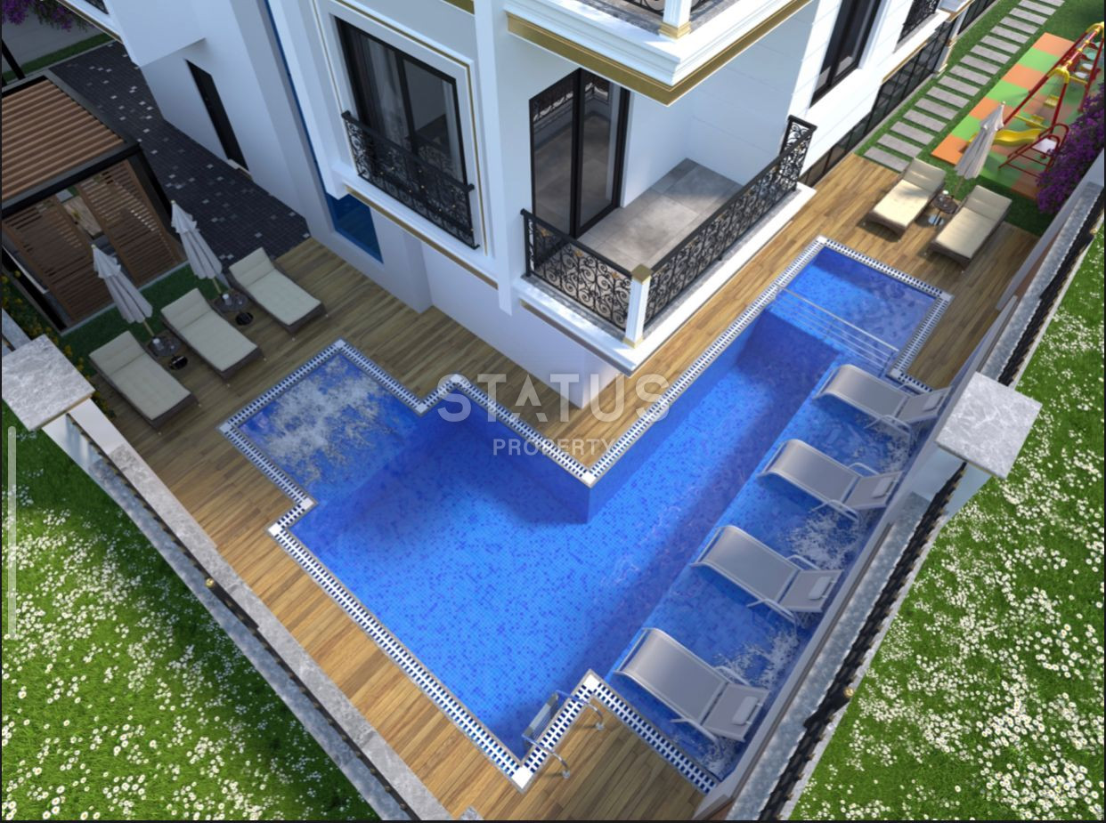 Комплекс на стадии строительства в Махмутларе, апартаменты 1+1, дуплексы 2+1 и 3+1. фото 4