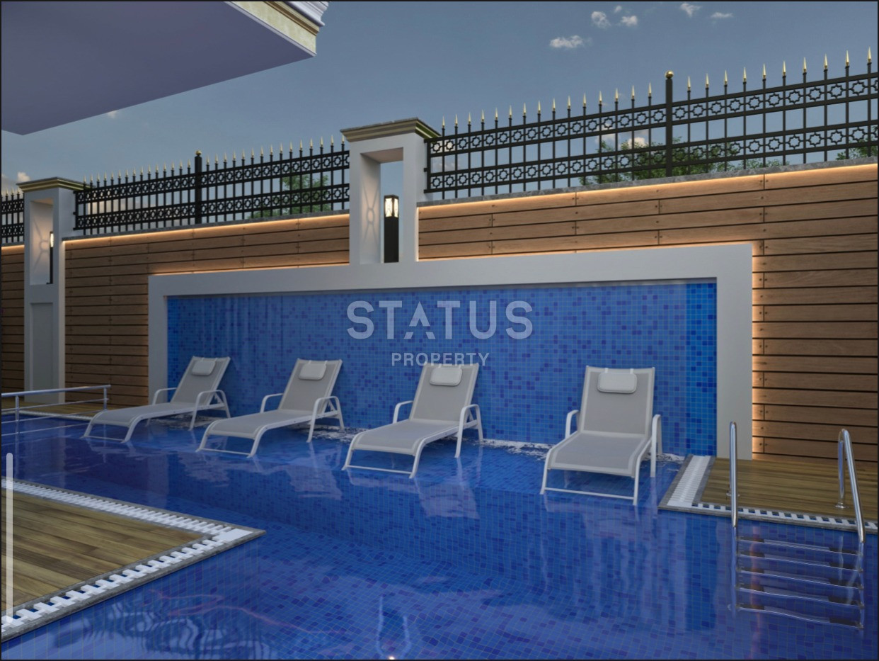 Комплекс на стадии строительства в Махмутларе, апартаменты 1+1, дуплексы 2+1 и 3+1. фото 6