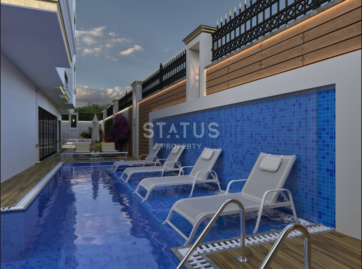 Комплекс на стадии строительства в Махмутларе, апартаменты 1+1, дуплексы 2+1 и 3+1. фото 7