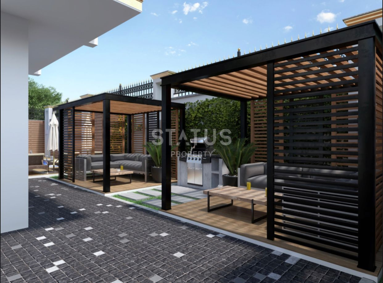 Комплекс на стадии строительства в Махмутларе, апартаменты 1+1, дуплексы 2+1 и 3+1. фото 8