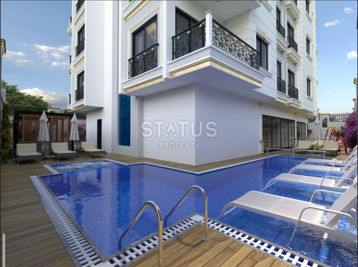 Комплекс на стадии строительства в Махмутларе, апартаменты 1+1, дуплексы 2+1 и 3+1. фото 9