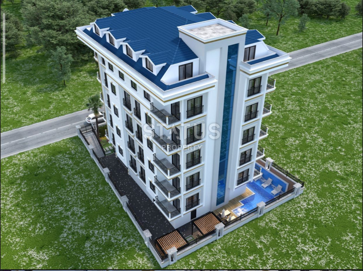 Комплекс на стадии строительства в Махмутларе, апартаменты 1+1, дуплексы 2+1 и 3+1. фото 17