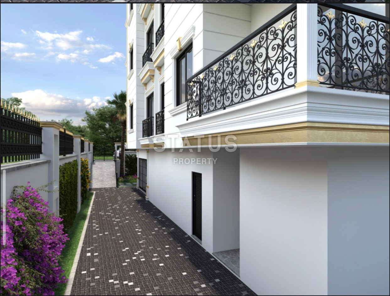 Комплекс на стадии строительства в Махмутларе, апартаменты 1+1, дуплексы 2+1 и 3+1. фото 18