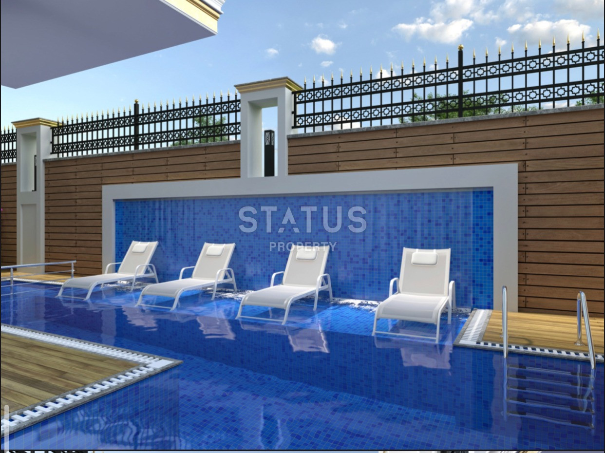 Комплекс на стадии строительства в Махмутларе, апартаменты 1+1, дуплексы 2+1 и 3+1. фото 19