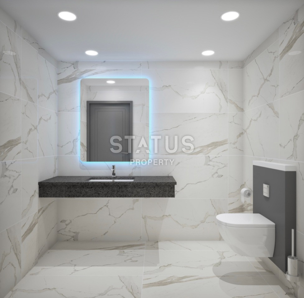 Комплекс на стадии строительства в Махмутларе, апартаменты 1+1, дуплексы 2+1 и 3+1. фото 21