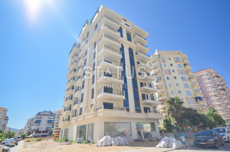 Новая трехкомнатная квартира в Махмутларе, 115 м2 фото 1