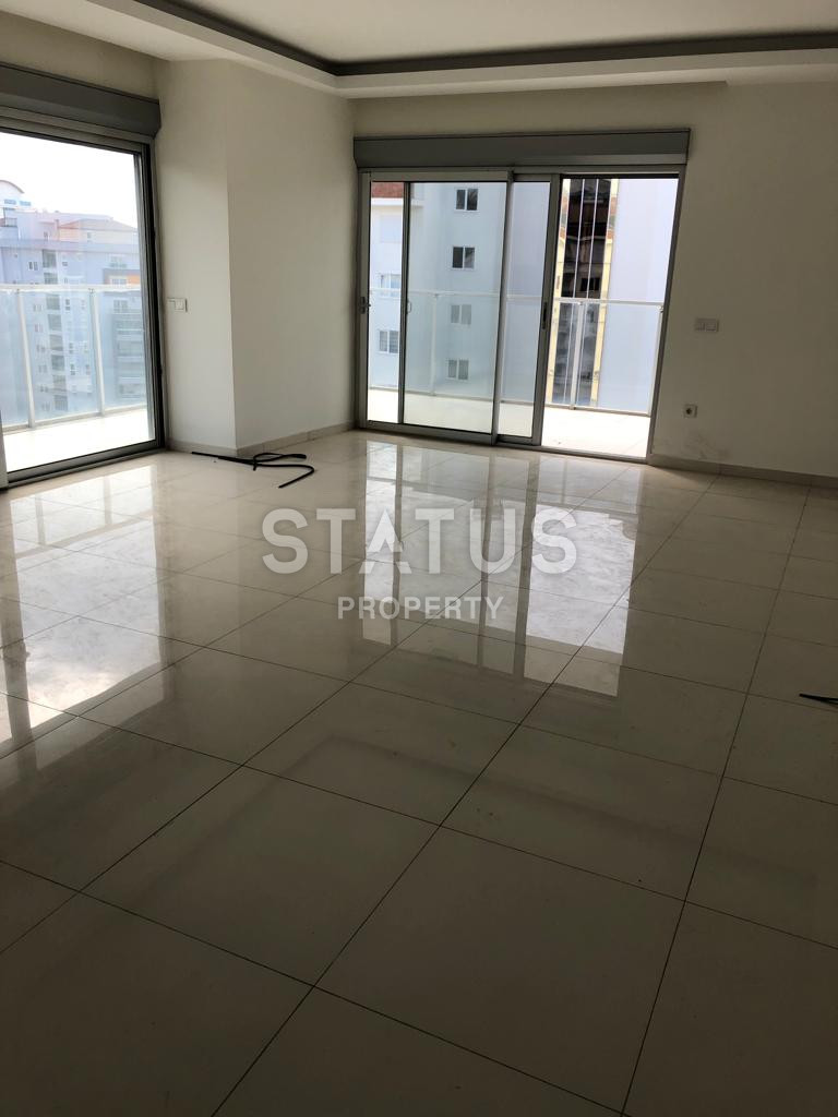 Трехкомнатная квартира без мебели в 600 метрах от моря в Махмутларе, 105м.кв фото 2