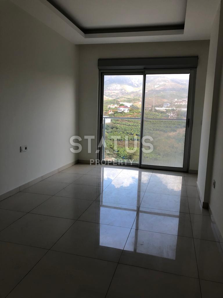 Трехкомнатная квартира без мебели в 600 метрах от моря в Махмутларе, 105м.кв фото 3