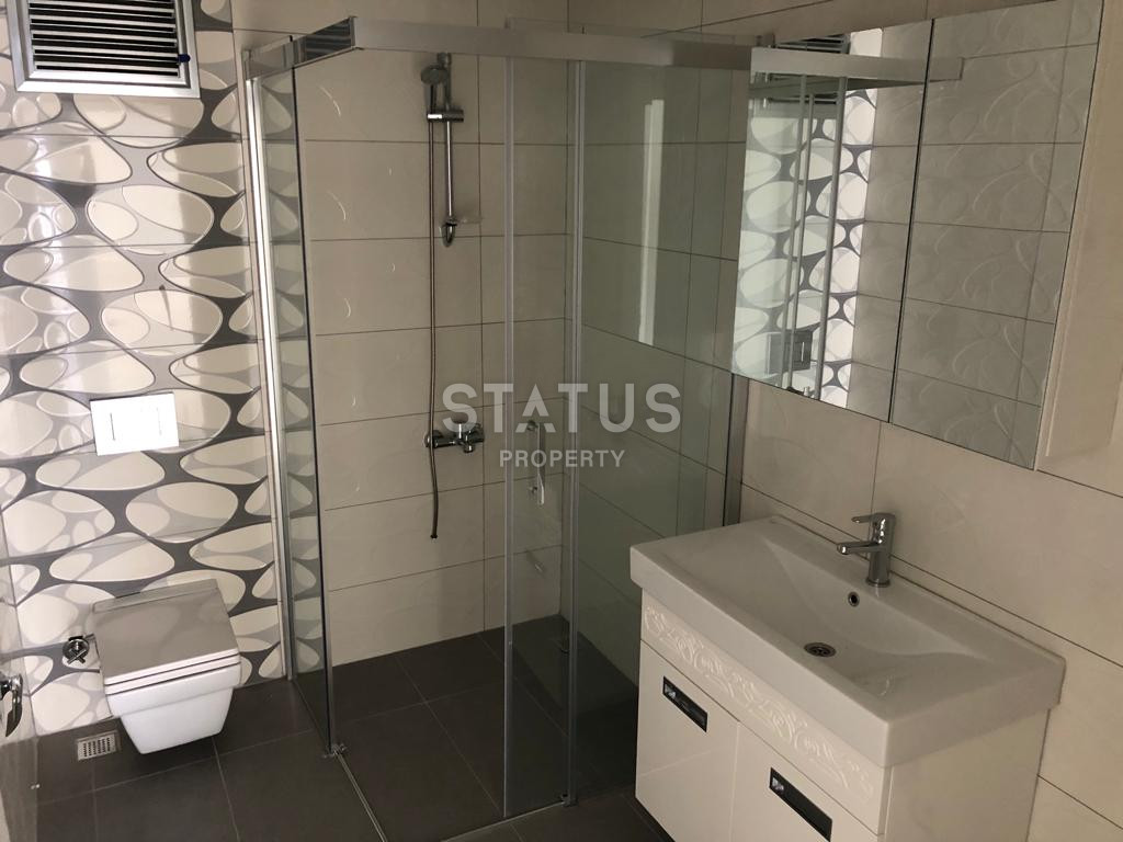 Трехкомнатная квартира без мебели в 600 метрах от моря в Махмутларе, 105м.кв фото 10