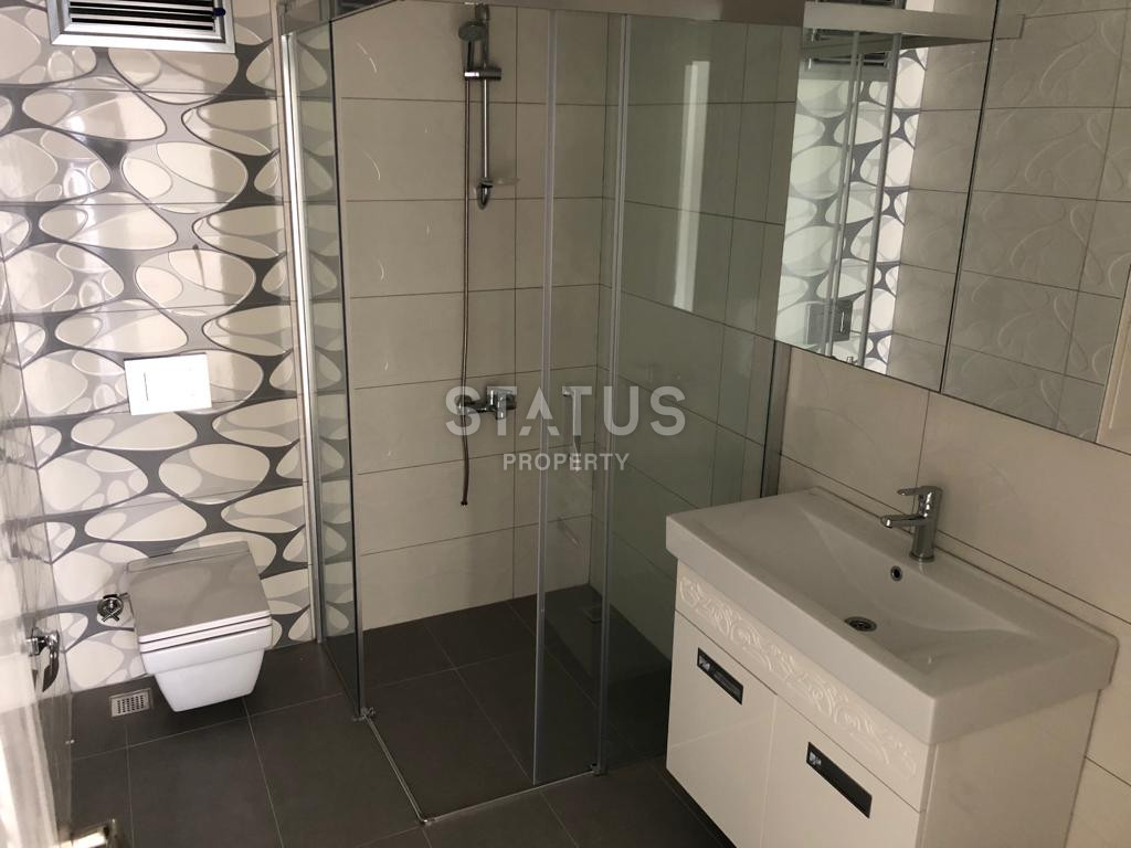 Трехкомнатная квартира без мебели в 600 метрах от моря в Махмутларе, 105м.кв фото 11