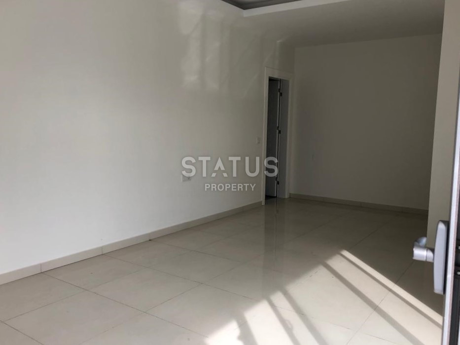 Трехкомнатная квартира без мебели в 600 метрах от моря в Махмутларе, 105м.кв фото 14