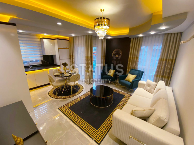 Апартаменты с мебелью 1+1 в районе Махмутлар, 60 м2 фото 1