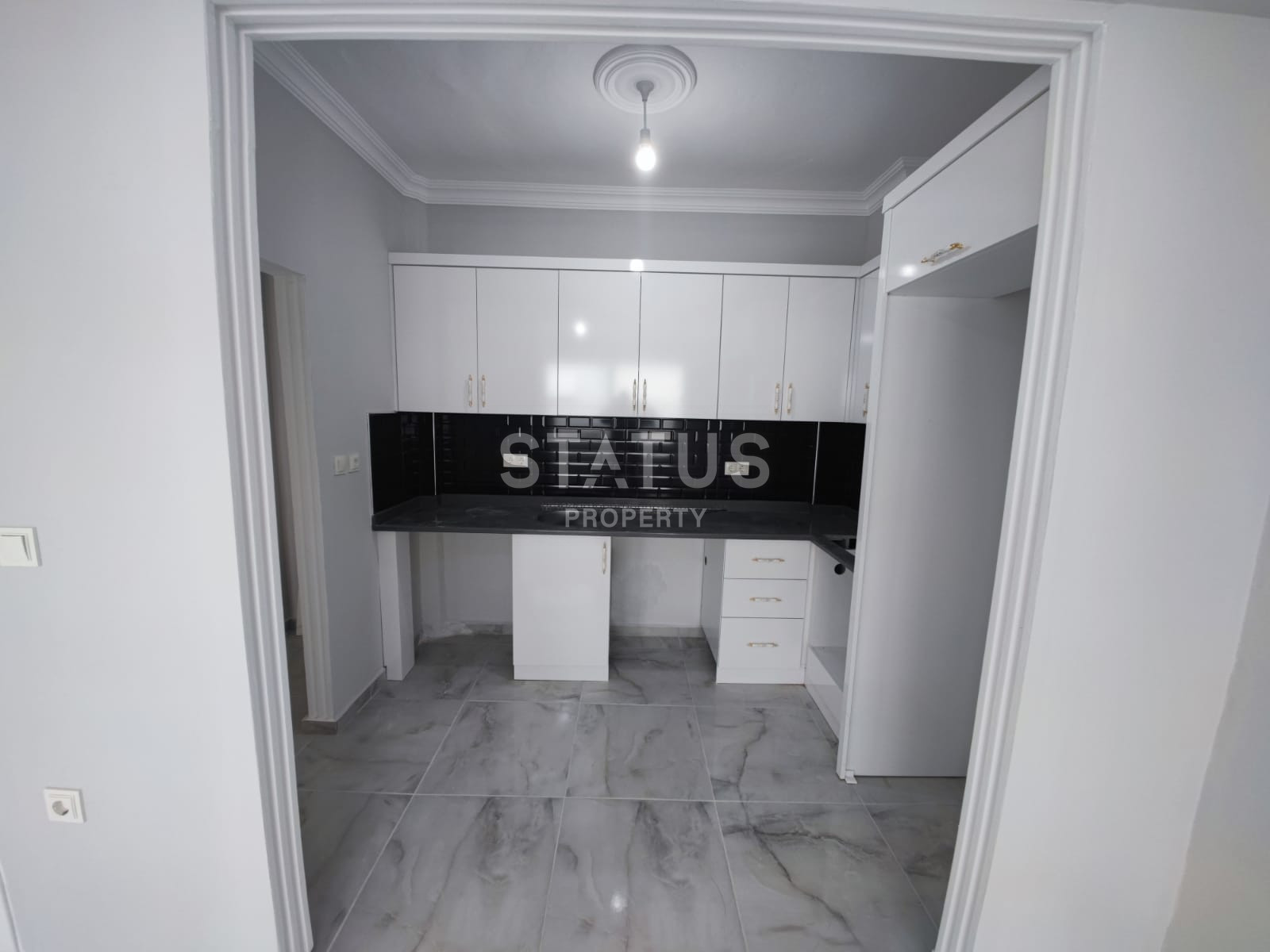 Бюджетная квартира 2+1 в районе Махмутлар с ремонтом фото 3