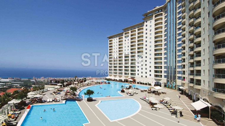 Апартаменты 2+1 в известном Gold City с красивым видом на горы фото 1