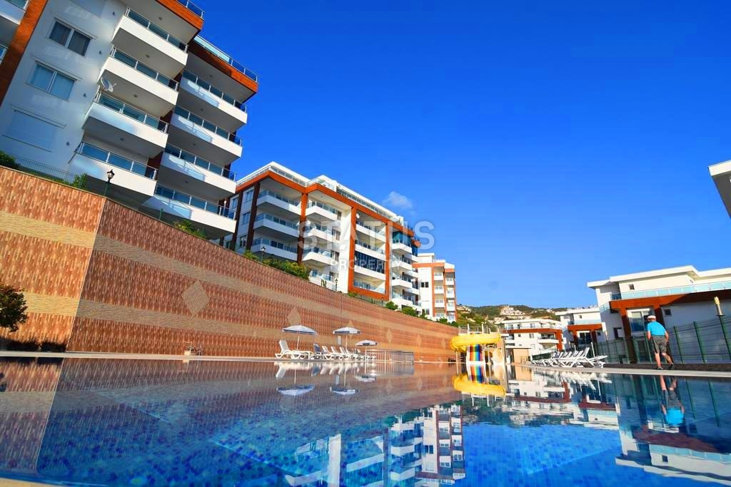 Квартира 2+1 с мебелью в 800 метрах от моря, в Каргыджаке, 125 кв.м. фото 1