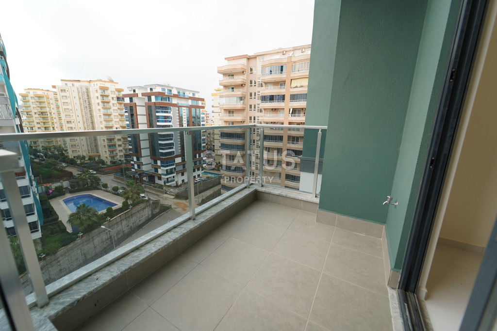 Апартаменты 1+1 в презентабельном комплексе в районе Махмутлар, 55 м2 фото 4