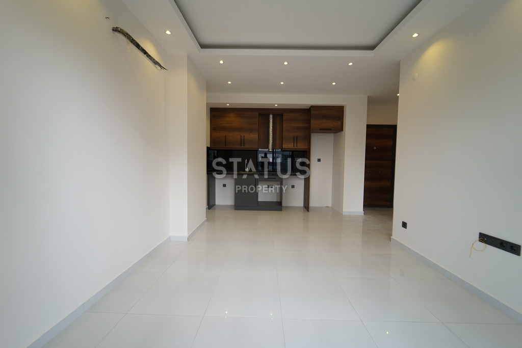 Апартаменты 1+1 в презентабельном комплексе в районе Махмутлар, 55 м2 фото 6