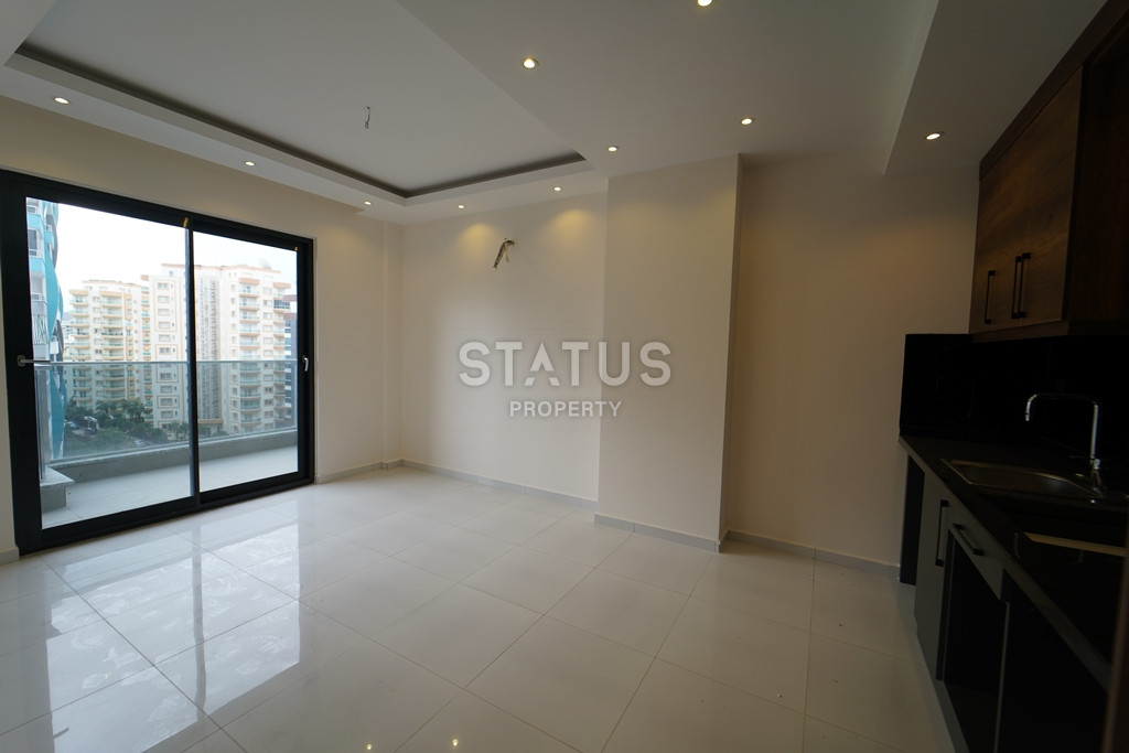 Апартаменты 1+1 в презентабельном комплексе в районе Махмутлар, 55 м2 фото 9