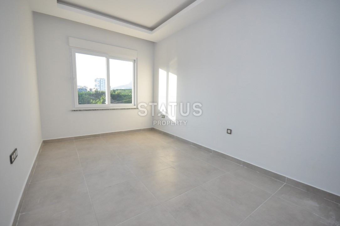 Апартаменты 1+1 в районе Махмутлар, 56 м2 фото 5