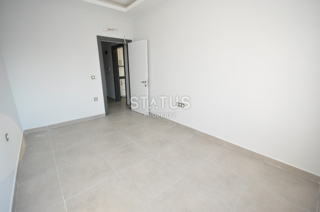 Апартаменты 1+1 в районе Махмутлар, 56 м2 фото 6