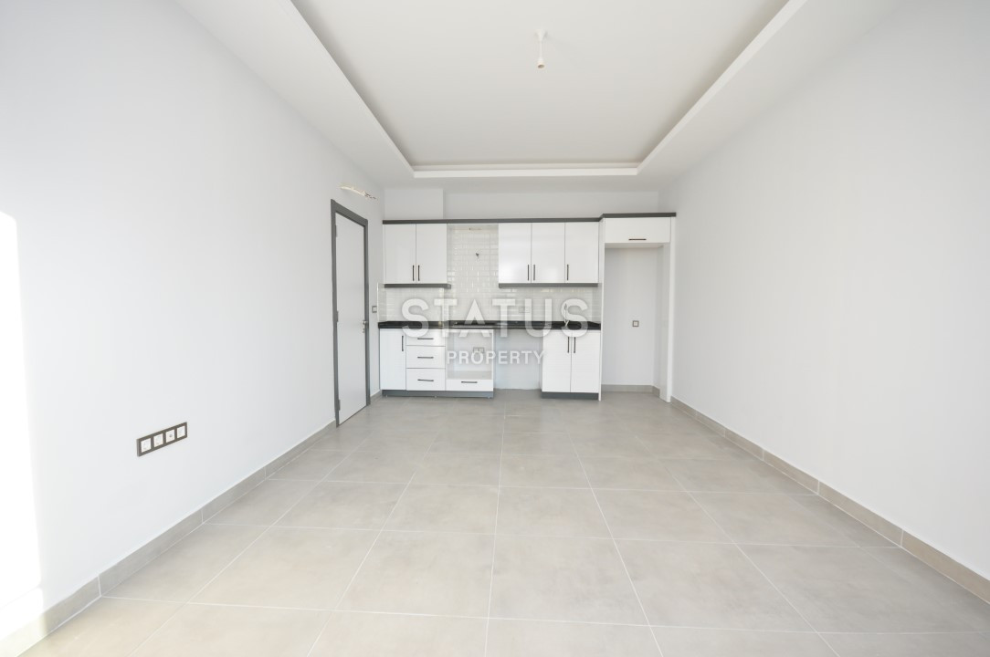 Апартаменты 1+1 в районе Махмутлар, 56 м2 фото 7