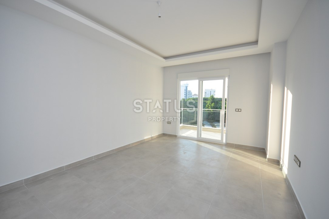 Апартаменты 1+1 в районе Махмутлар, 56 м2 фото 8