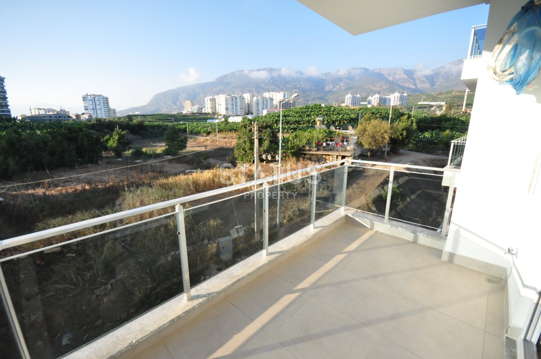 Апартаменты 1+1 в районе Махмутлар, 56 м2 фото 12