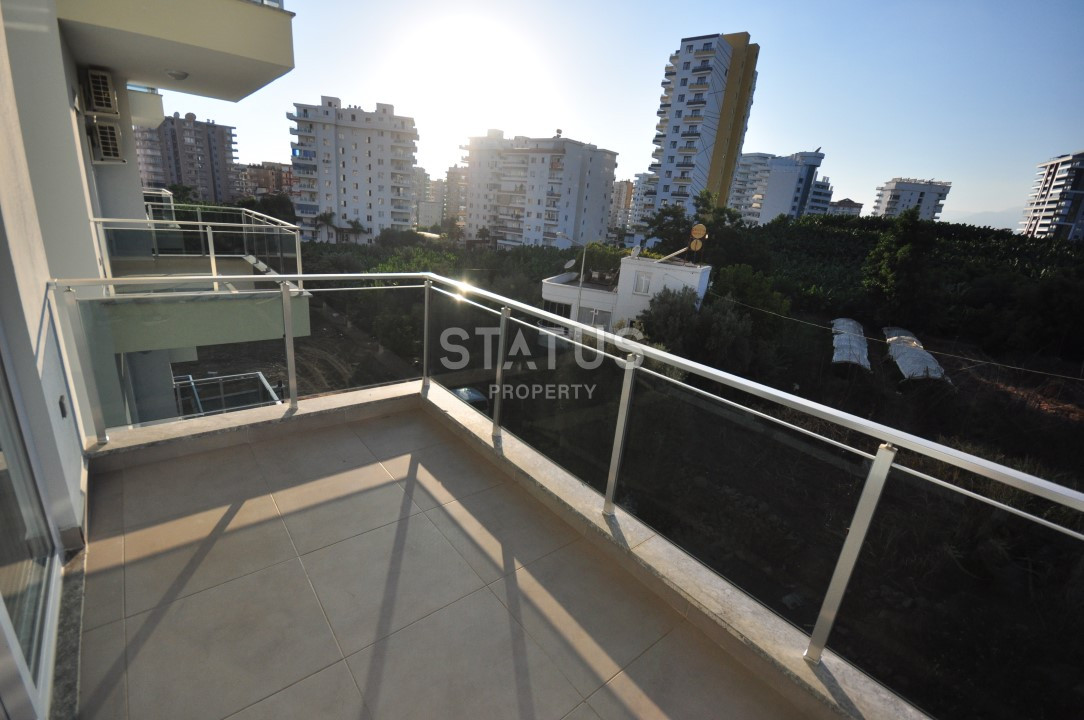 Апартаменты 1+1 в районе Махмутлар, 56 м2 фото 13