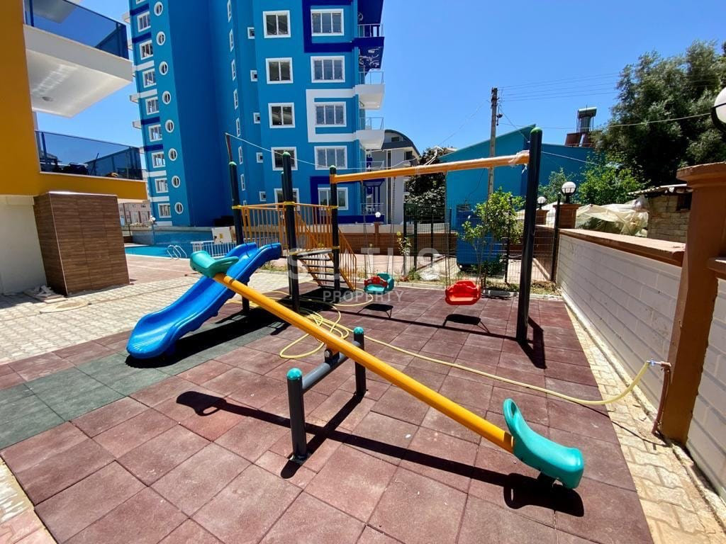 Apartment 1+1 in a new building with infrastructure in Mahmutlar, 50m2. фото 5