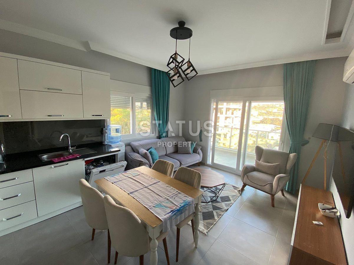 Апартаменты 1+1 в новом комплексе в Авсалларе, полный пакет мебели и техники фото 6