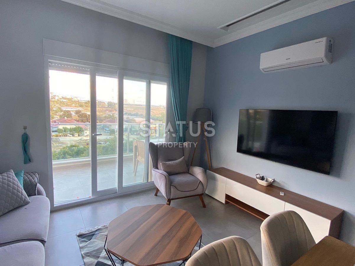 Апартаменты 1+1 в новом комплексе в Авсалларе, полный пакет мебели и техники фото 9