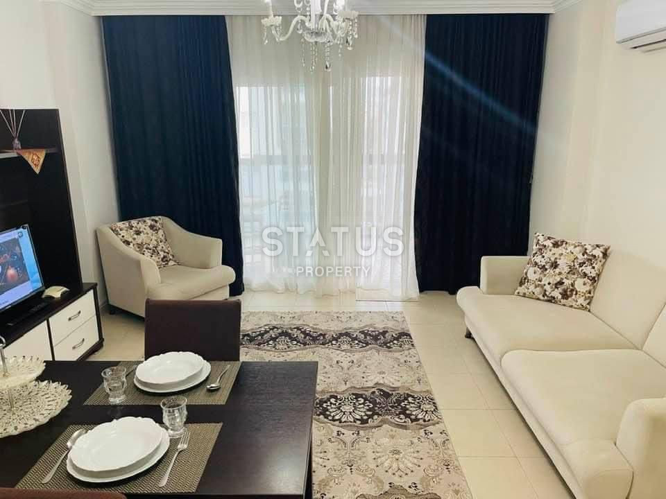 Меблированные апартаменты 1+1 в центре района Махмутлар, 60 м2 фото 3