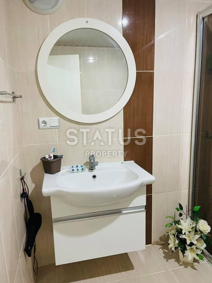 Меблированные апартаменты 1+1 в центре района Махмутлар, 60 м2 фото 6