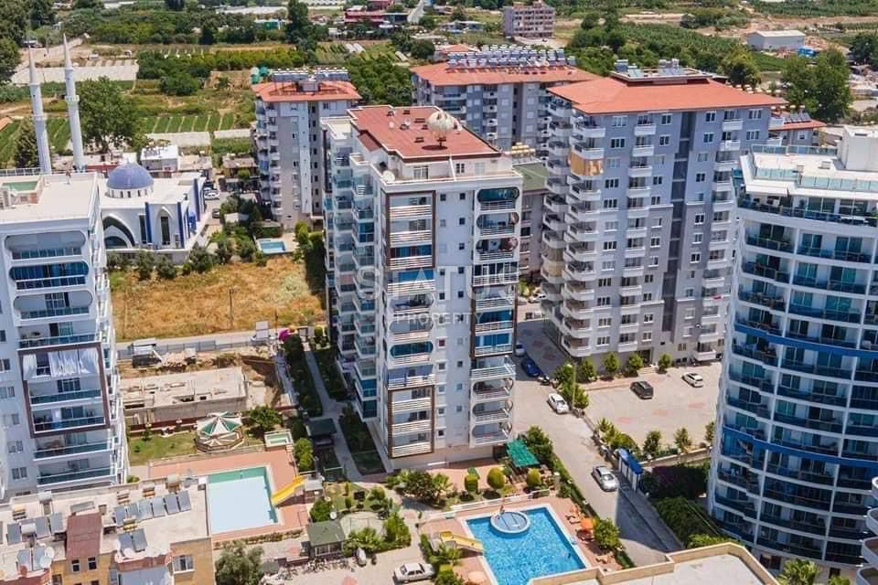 Меблированные апартаменты 1+1 в центре района Махмутлар, 60 м2 фото 18