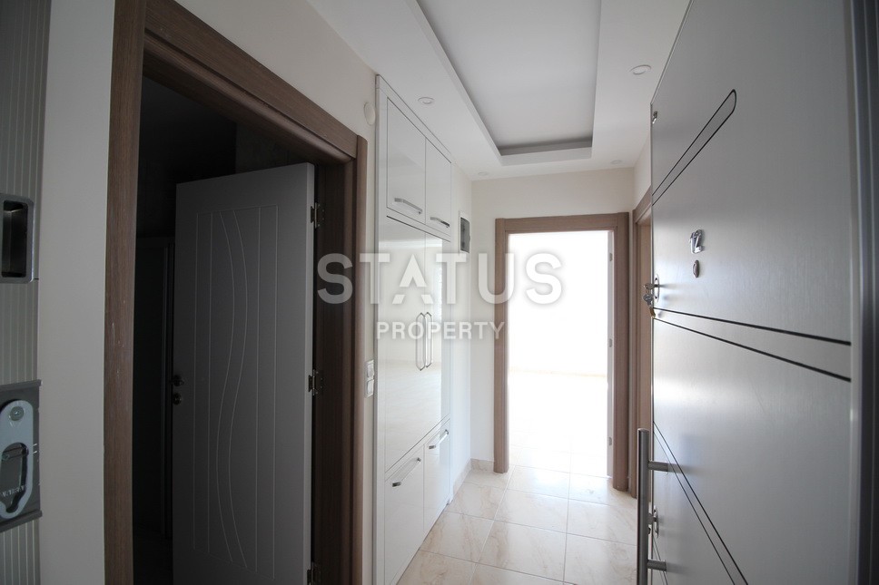 Новые апартаменты  в новом комплексе в самом центре Махмутлара. Большие площади и маленькие цены! 80 кв.м. фото 7