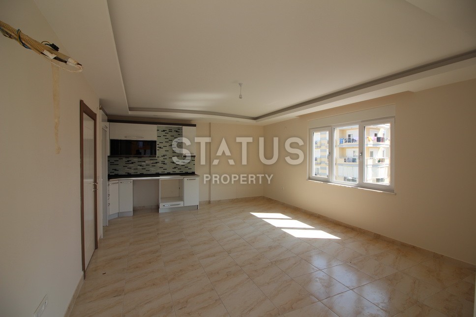 Новые апартаменты  в новом комплексе в самом центре Махмутлара. Большие площади и маленькие цены! 80 кв.м. фото 14