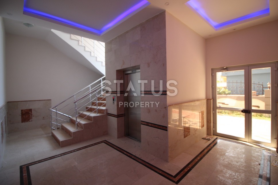 Новые апартаменты  в новом комплексе в самом центре Махмутлара. Большие площади и маленькие цены! 80 кв.м. фото 19